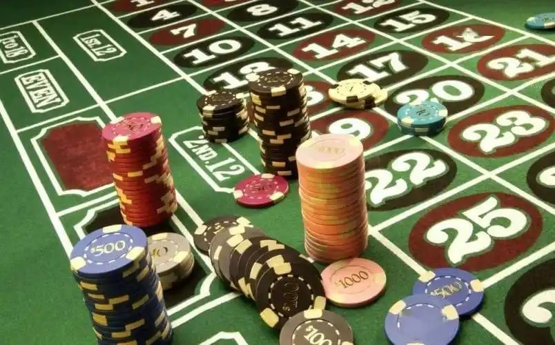 Live roulette table with dealer and gaming interface